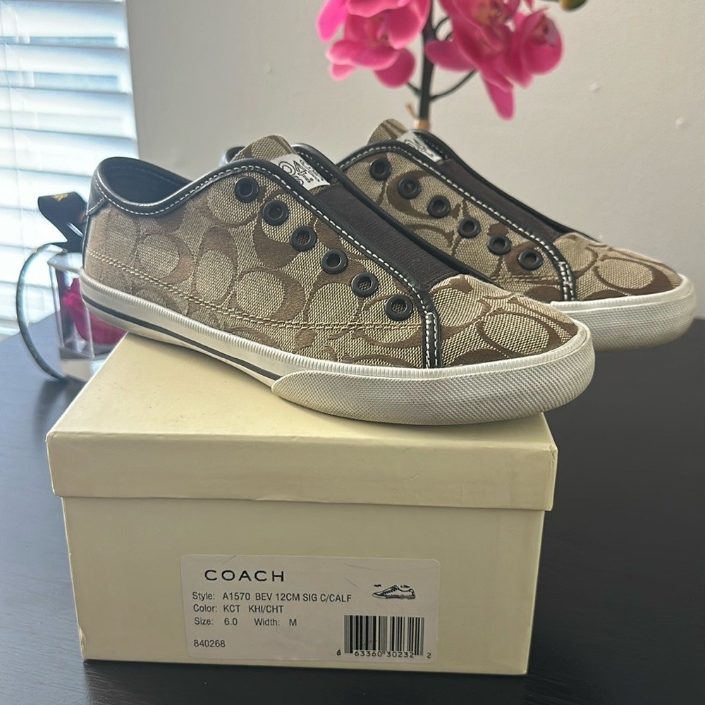 Coach slide on sneaker.  Great condition! Size 6